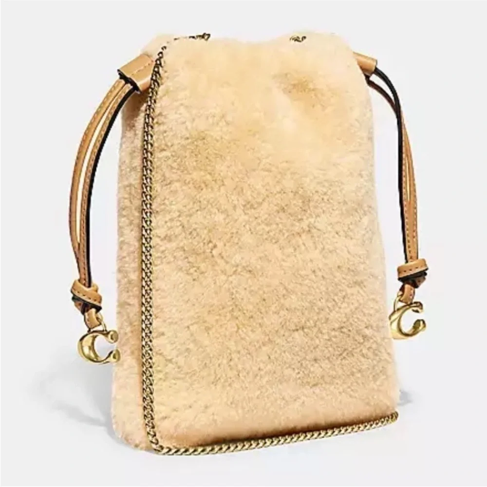 Coach natural shearling mini drawstring crossbody NWT